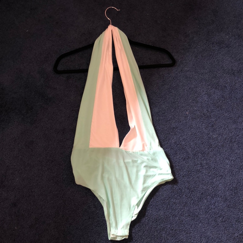 Woman’s Super Plunged Bodysuit